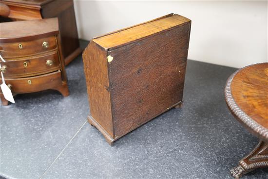 A mid 18th century style miniature walnut bureau, 9in., height 9.5in.